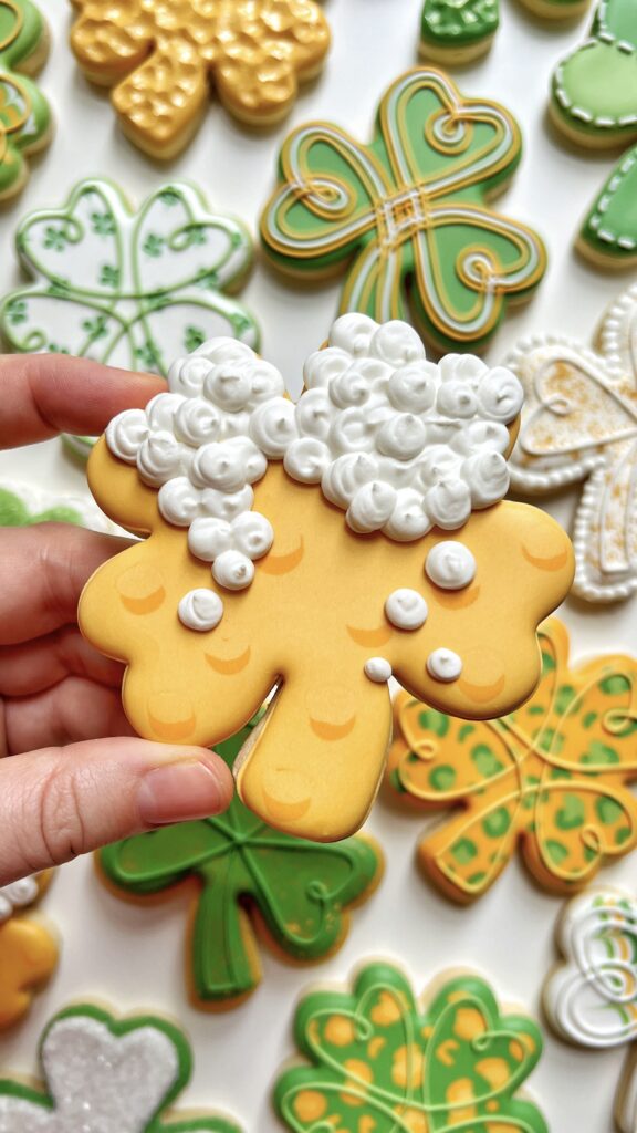 beer clover cookie decorated with royal icing 