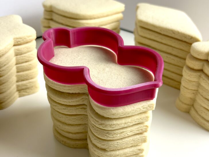 Rolled sugar cookies stacked perfectly 7 high 
