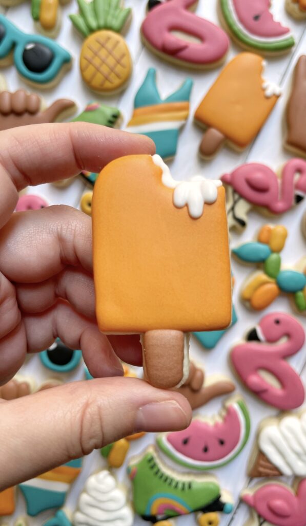 popsicle cookie decorated with royal icing 