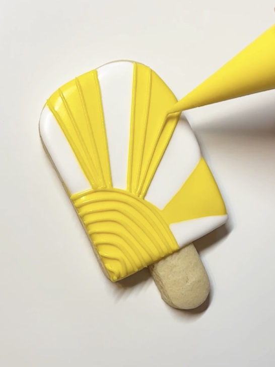 piping lines with royal icing