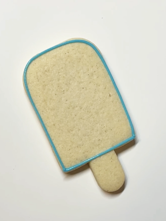 cookie outlined with royal icing