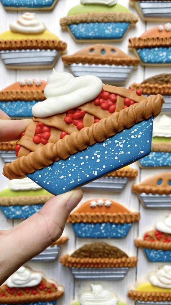 cherry pie cookie decorated with royal icing 