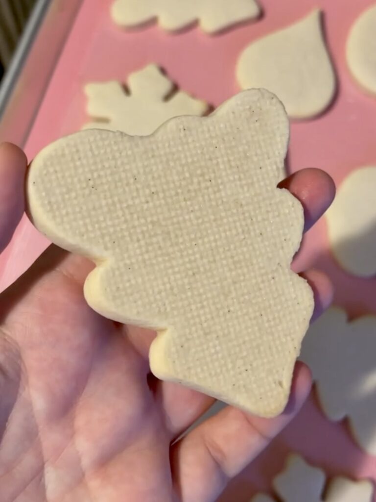 perfectly baked sugar cookie that is not too dry or crumbly or taste like flour