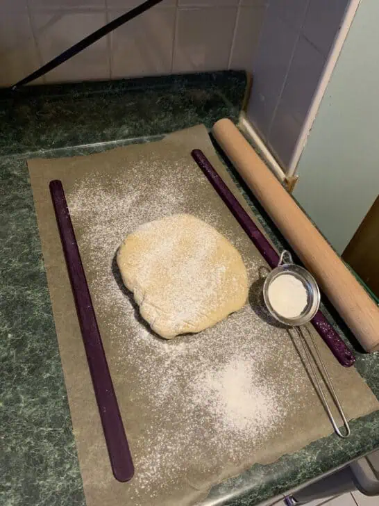 roll out cookie dough with powdered sugar instead of flour to prevent the cookies from tasting too much like flour
