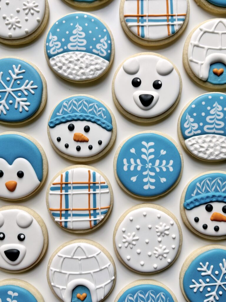 photo of winter cookies with perfect royal icing consistency not too thick or too thin