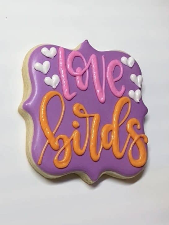 step 1 of decorating love birds cookies with royal icing