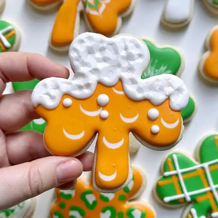 easy shamrock cookie decorated as beer with royal icing