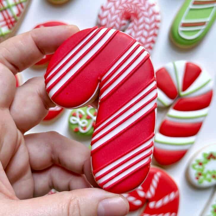 striped Candy Cane Decorated Cookies with royal icing
