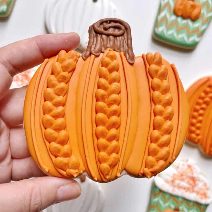 Pumpkin Cookies decorated with royal icing