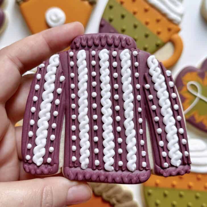 sweater cookies decorated with royal icing