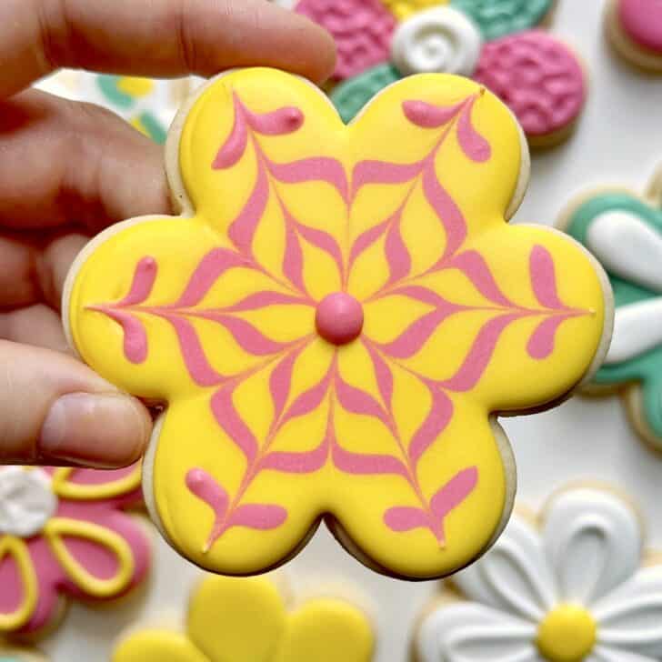 yellow flower cookies decorated with royal icing