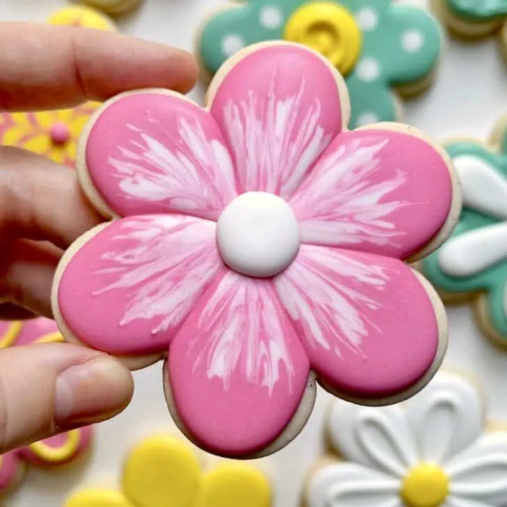 pink flower cookies decorated with royal icing