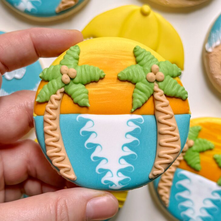 palm tree sunset cookies decorated with royal icing