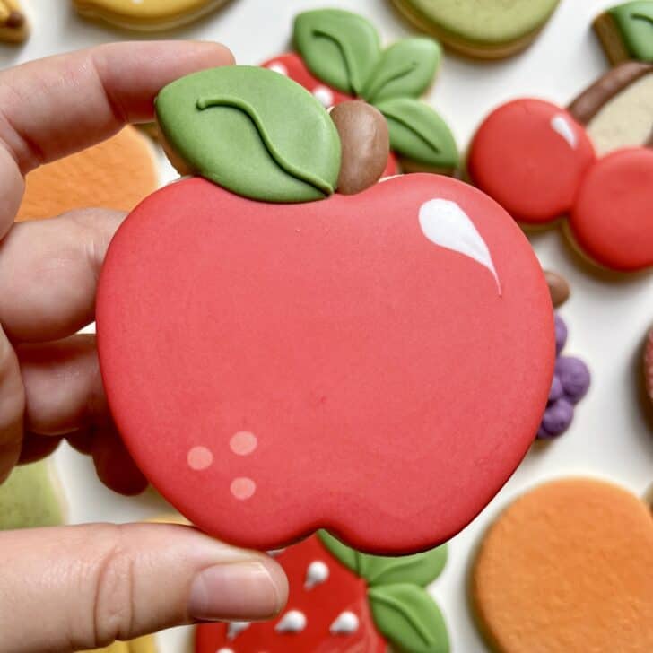 apple cookies decorated with royal icing