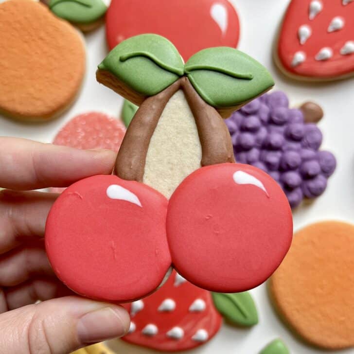 cherry cookies decorated with royal icing