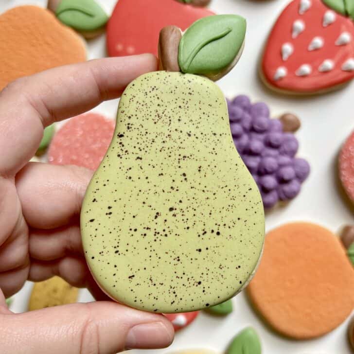 pear cookies decorated with royal icing