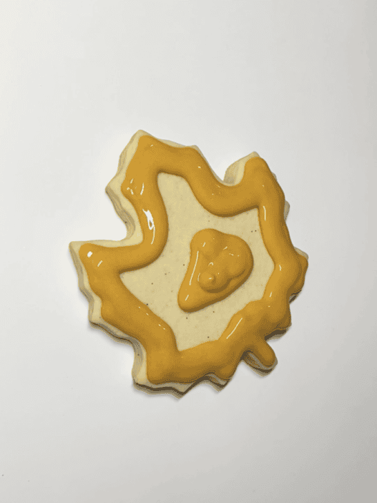 how to decorate a maple leaf cookie with royal icing