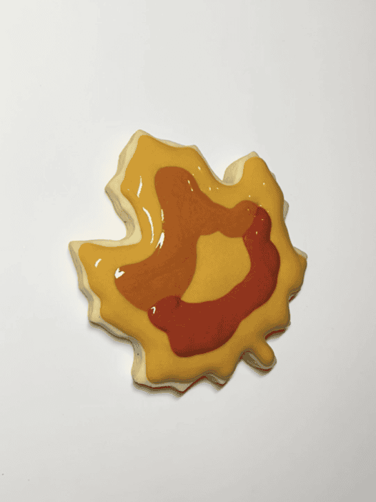 how to decorate a maple leaf cookie with royal icing
