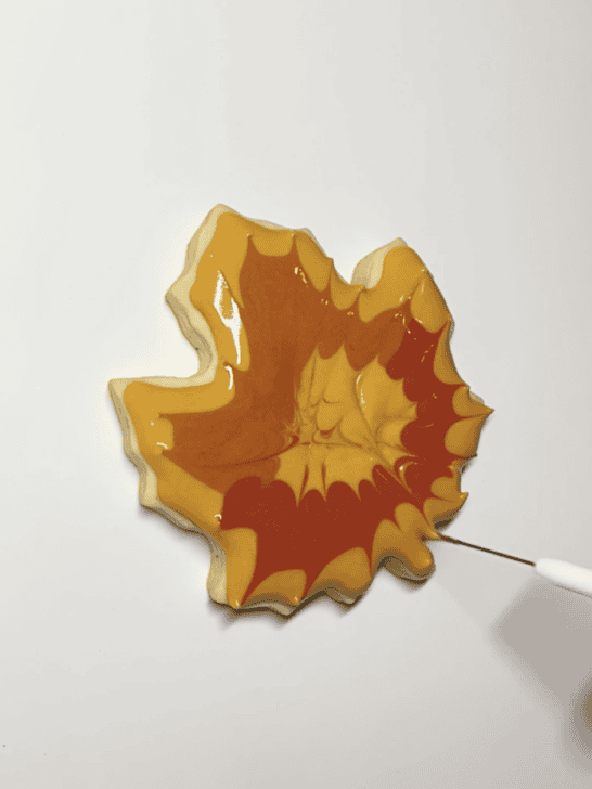 how to decorate a maple leaf cookie with royal icing