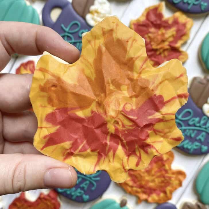 maple leaf cookie decorated with royal icing
