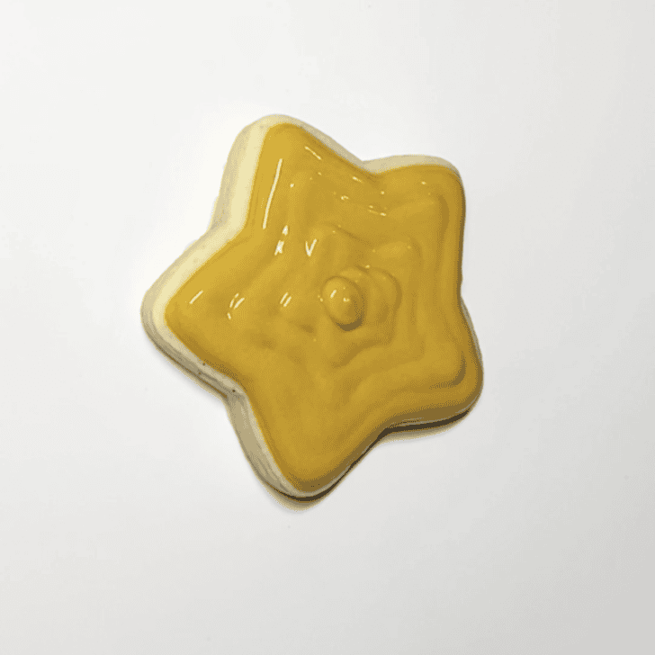 step by step directions for how to decorate christmas star cookies