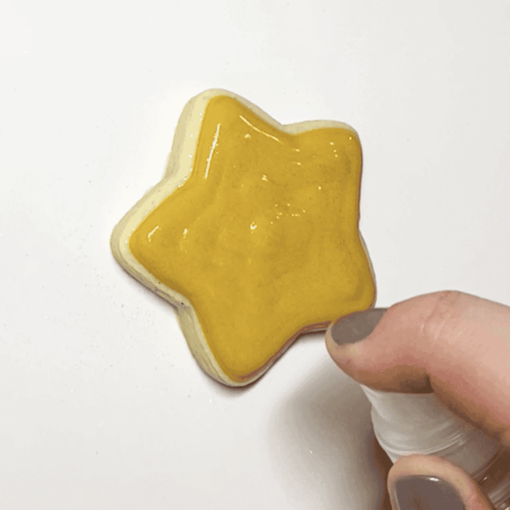 step by step directions for how to decorate christmas star cookies