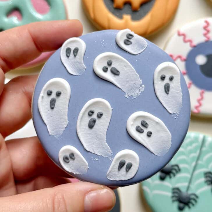 ghost cookie decorated with royal icing