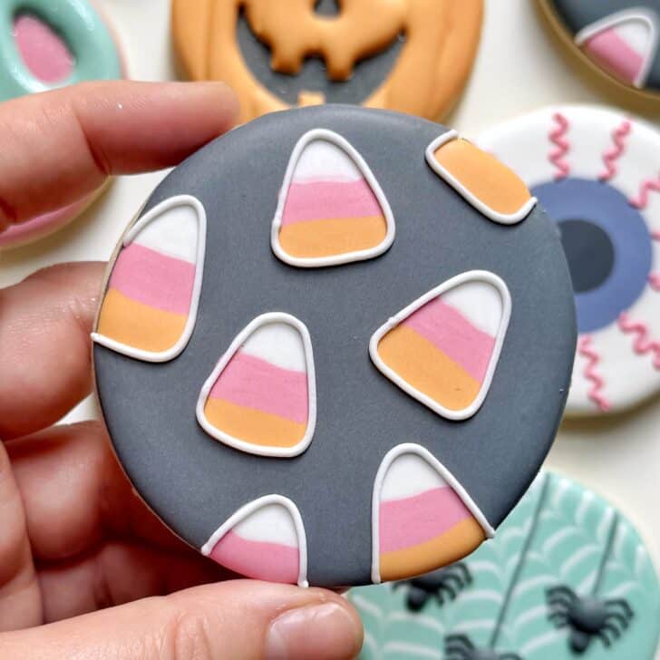 candy corn cookie decorated with royal icing