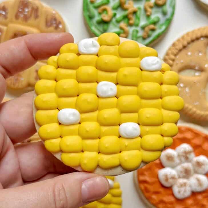 corn cookie decorated with royal icing