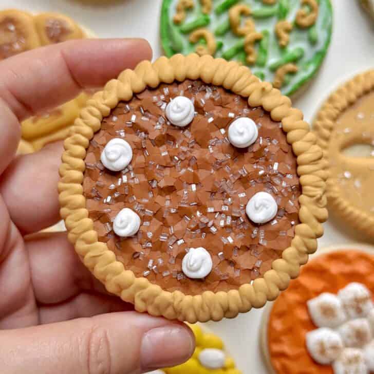 pecan pie cookie decorated with royal icing
