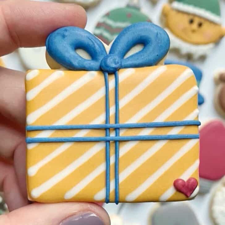 christmas present cookie decorated with royal icing