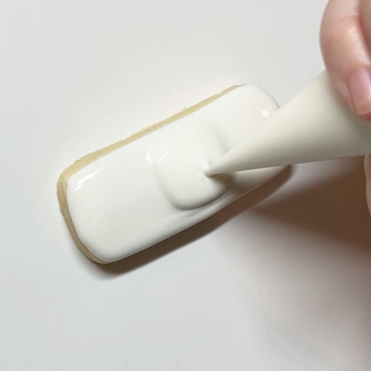 how to decorate band aid cookies with royal icing