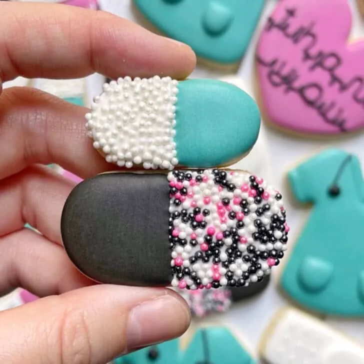 pill cookies decorated with royal icing