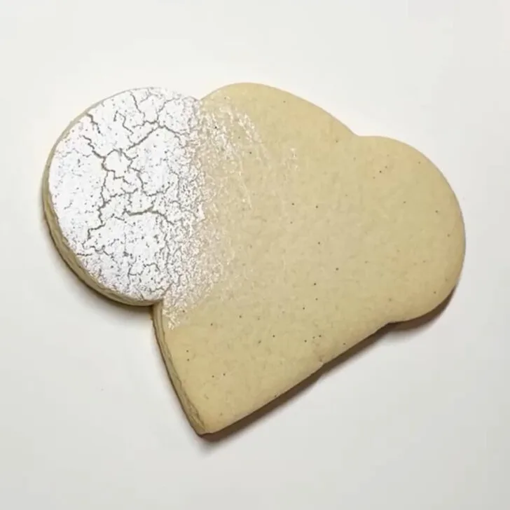 how to decorate Easter Tomb Cookies with royal icing with the white crackle technique