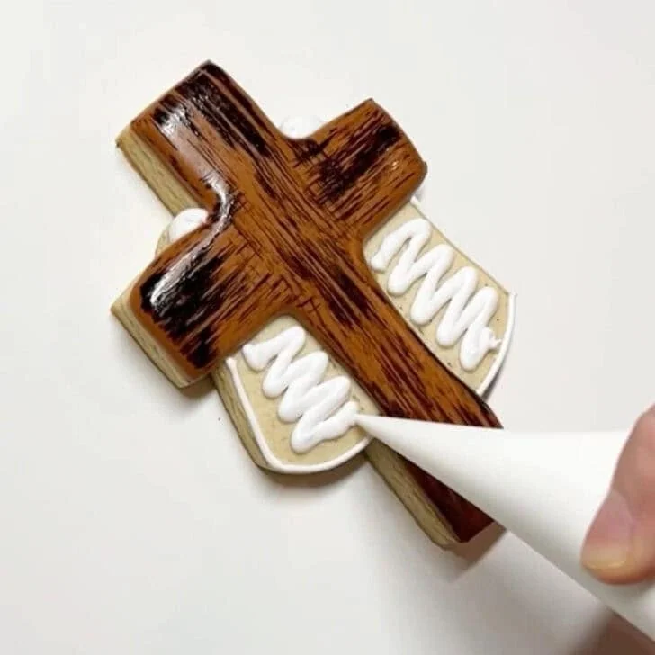 step by step instructions on how to decorate Cross Cookies for Easter with royal icing