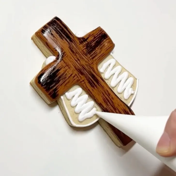 step by step instructions on how to decorate Cross Cookies for Easter with royal icing