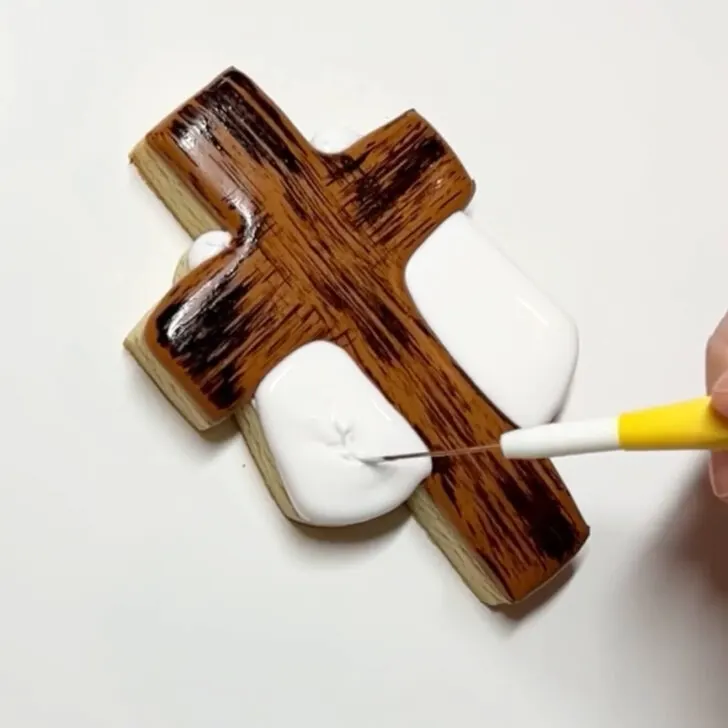 step by step instructions on how to decorate Cross Cookies for Easter with royal icing