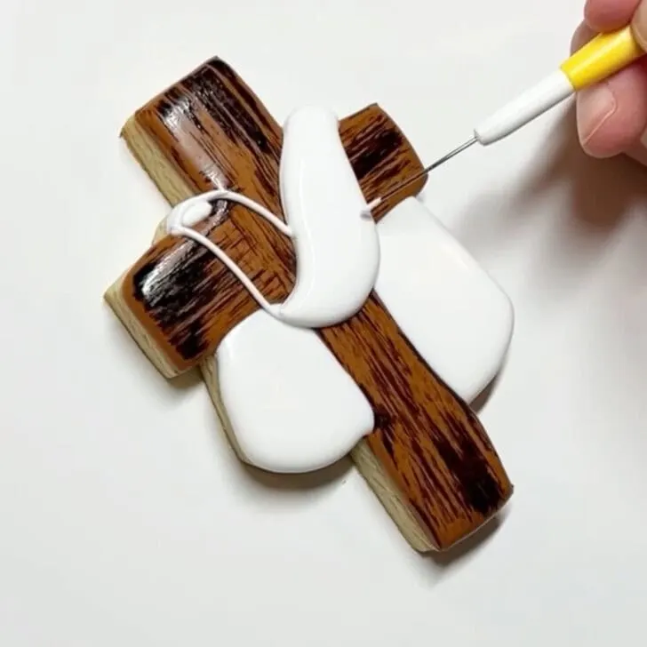 step by step instructions on how to decorate Cross Cookies for Easter with royal icing