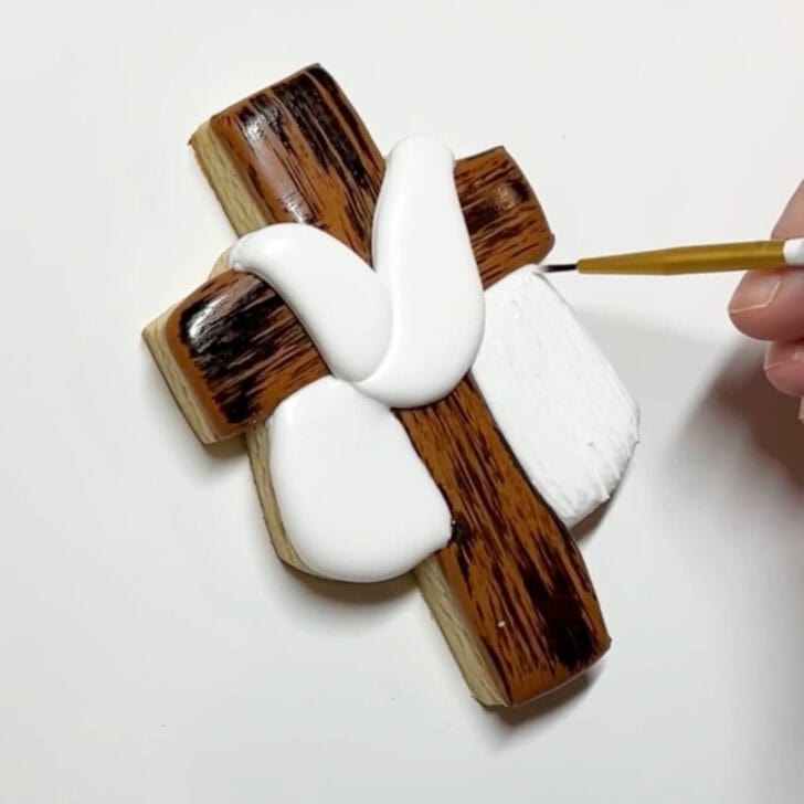 step by step instructions on how to decorate Cross Cookies for Easter with royal icing