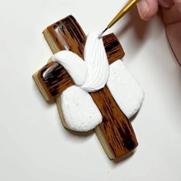 step by step instructions on how to decorate Cross Cookies for Easter with royal icing