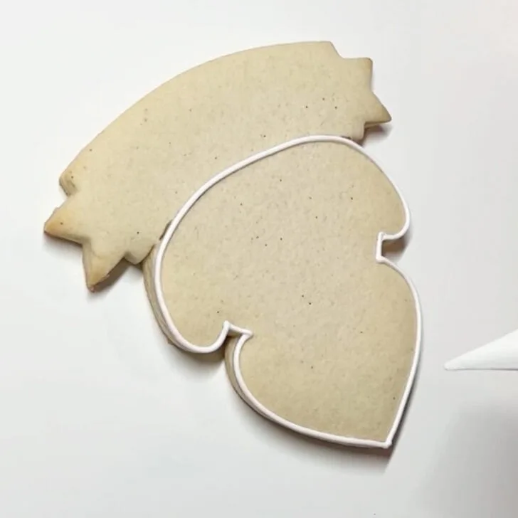 how to decorate teaching is a work of heart cookies with royal icing