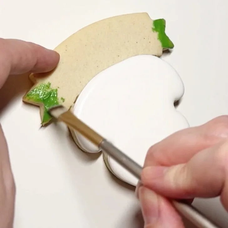 how to decorate teaching is a work of heart cookies with royal icing