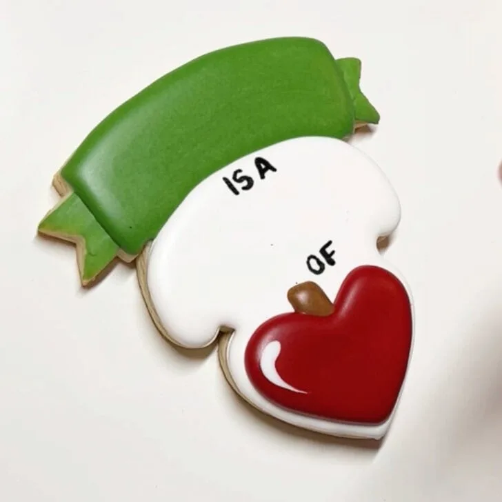 how to decorate teaching is a work of heart cookies with royal icing