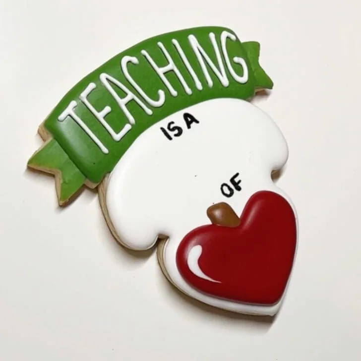 how to decorate teaching is a work of heart cookies with royal icing