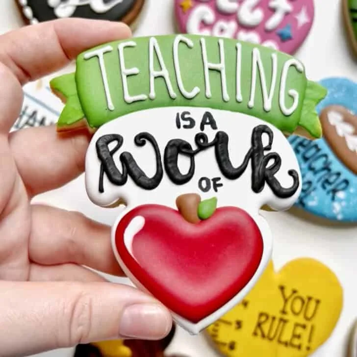 teaching is a work of heart cookies with royal icing