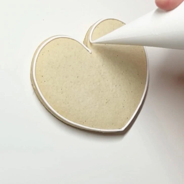 how to decorate teaching is a work of thank you cookies with royal icing