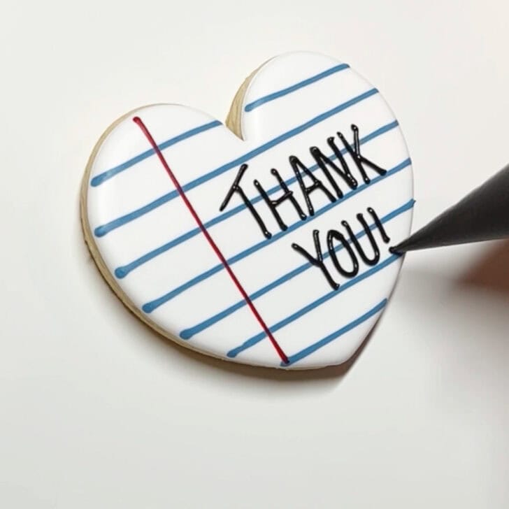 how to decorate teaching is a work of thank you cookies with royal icing