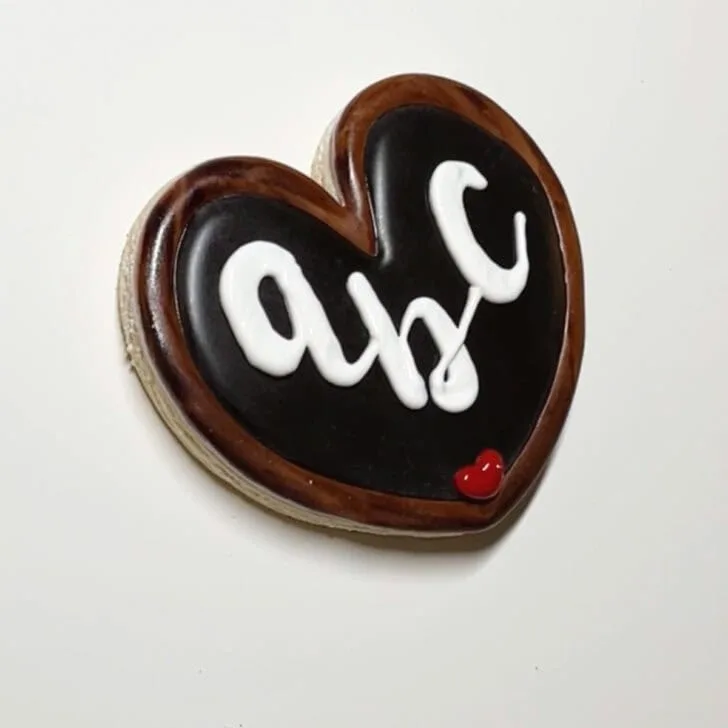 how to decorate chalkboard cookies decorated with royal icing