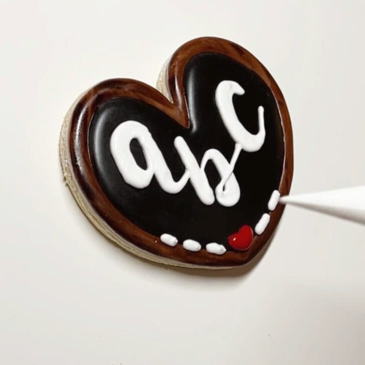 how to decorate chalkboard cookies decorated with royal icing