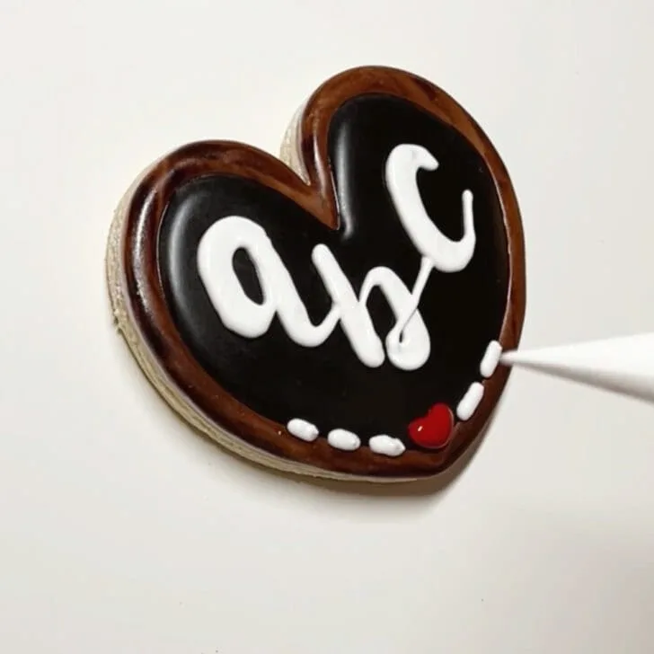 how to decorate chalkboard cookies decorated with royal icing